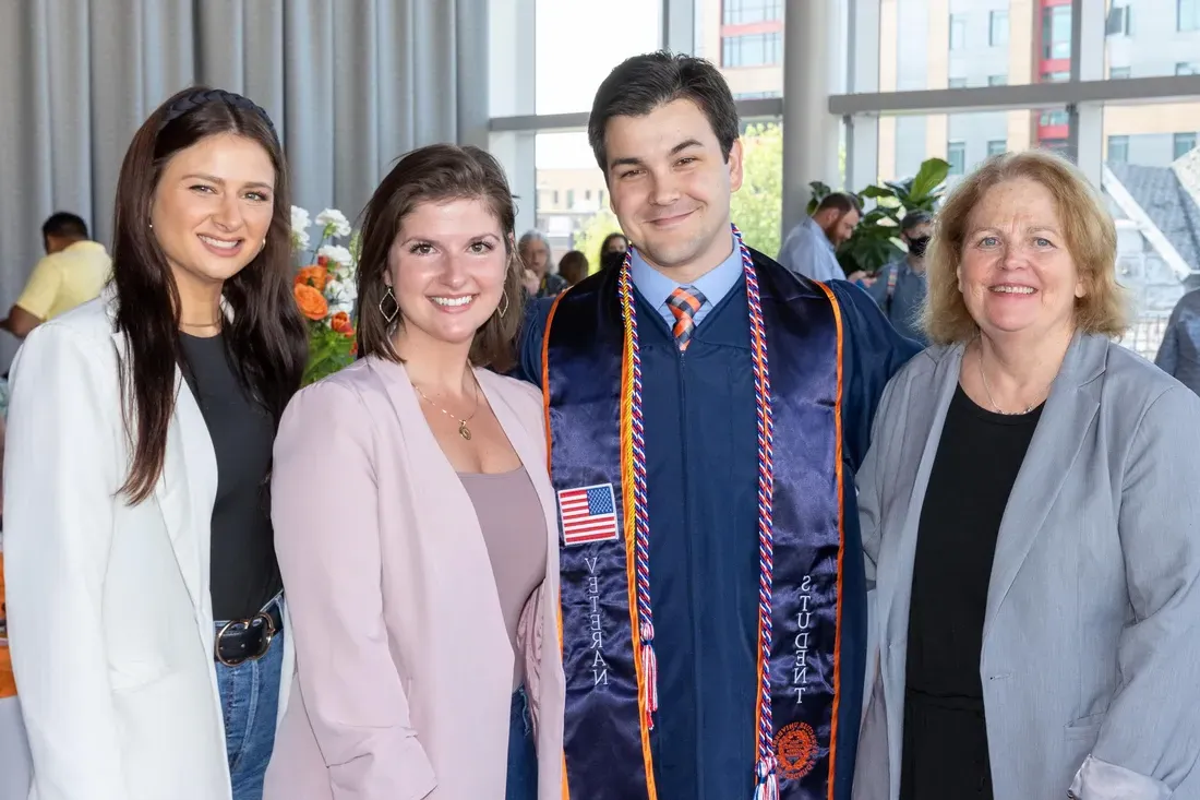 Veteran at graduation with family.